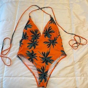 Tropical print one piece bathing suit